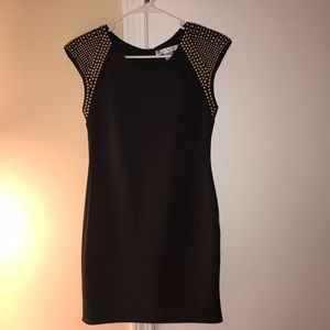 Black mini dress with gold stud detailing